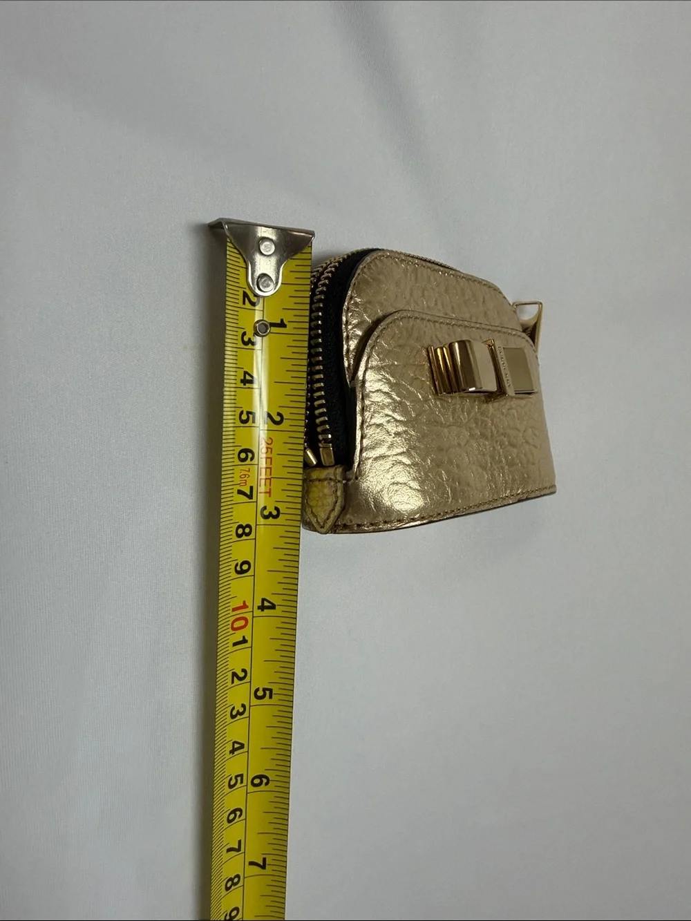 Burberry Metallic Gold Textured Mini Bow-Accent Pouch